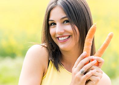 Mädchen mit einer Karotte